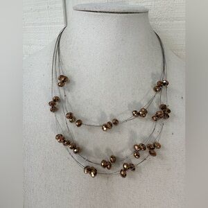 Sparkly faceted copper bead infinity style necklace